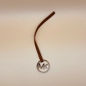 Michael Kors Gold bag charm with Brown Leather strap